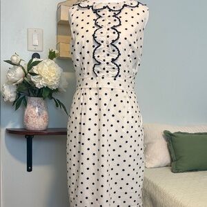 Biden Polka Dot Sleeveless Ruffle Sheath Dress in Cream and Black